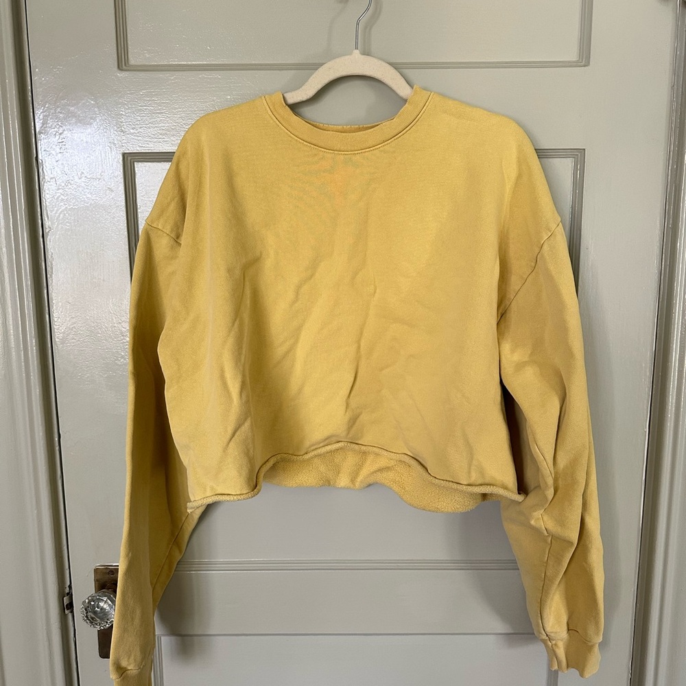 Vintage style yellow rolled edge cropped sweatshirt